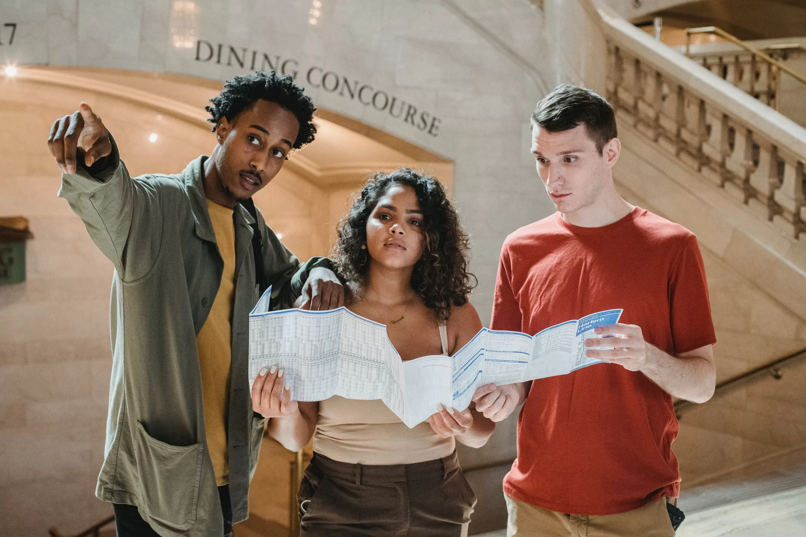 people searching, looking at a map
