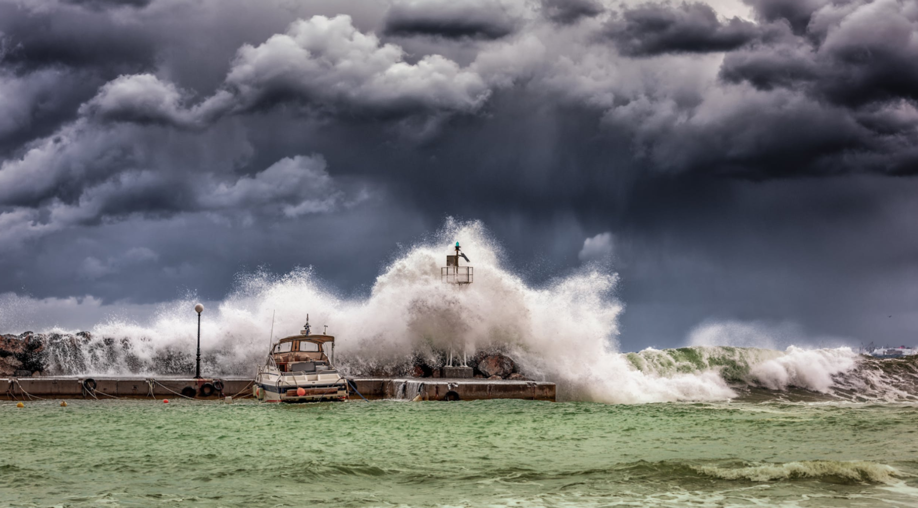a wave crash into a dock