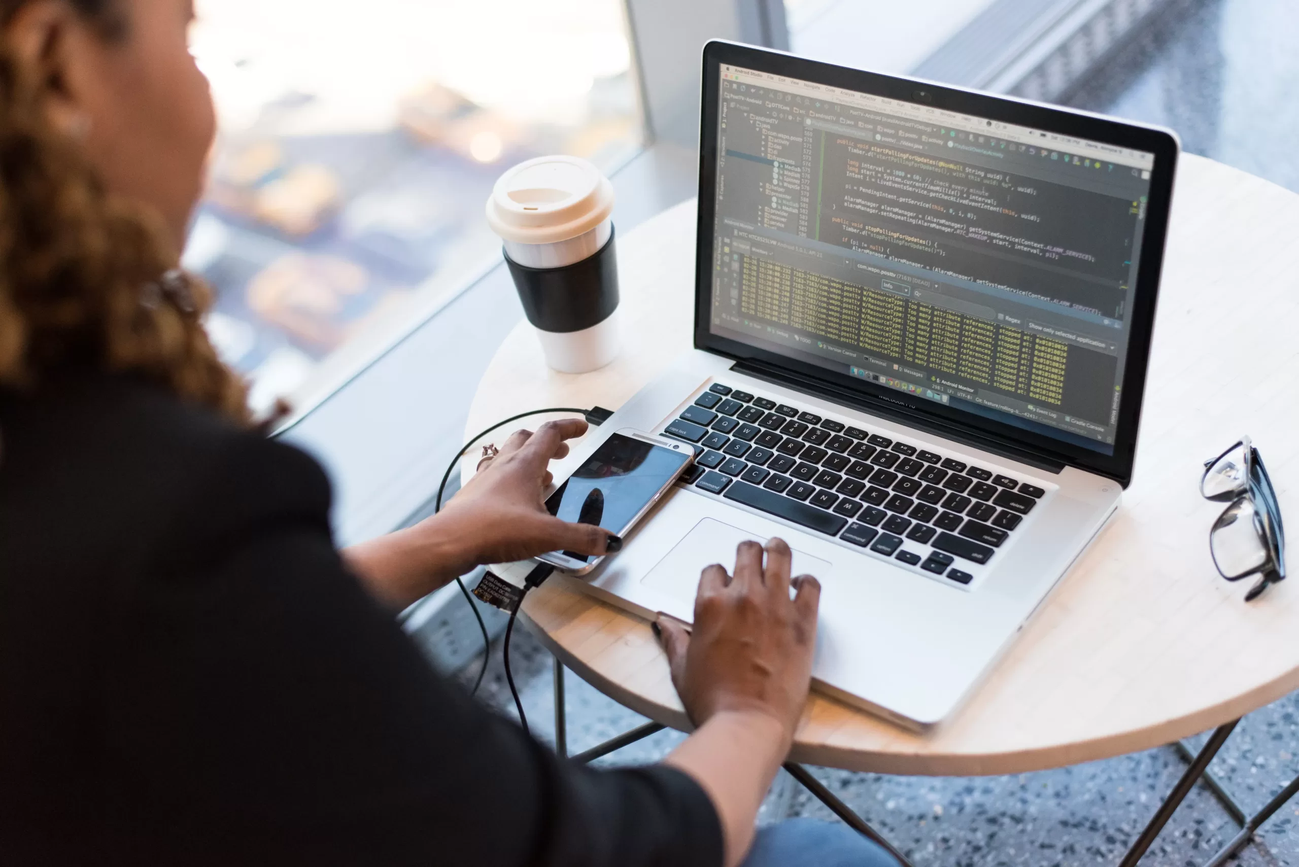 someone looking at data on a laptop