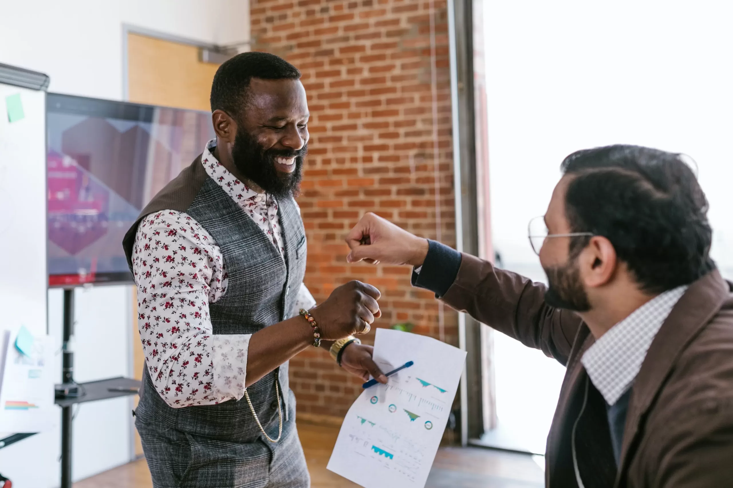two men congratulating one another